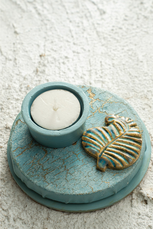 Ceramic motif mounted on canvas with a mdf base