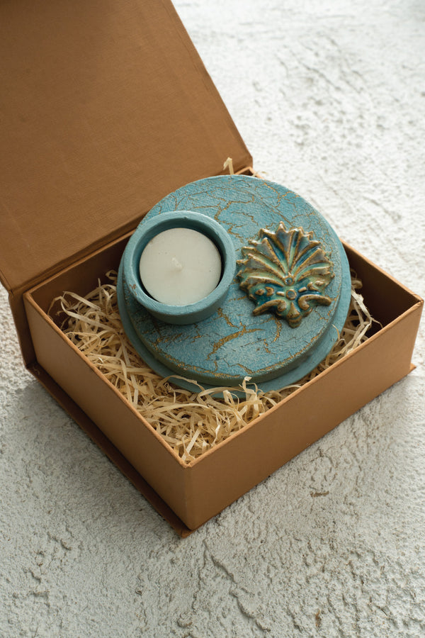 Ceramic motif mounted on canvas with a mdf base