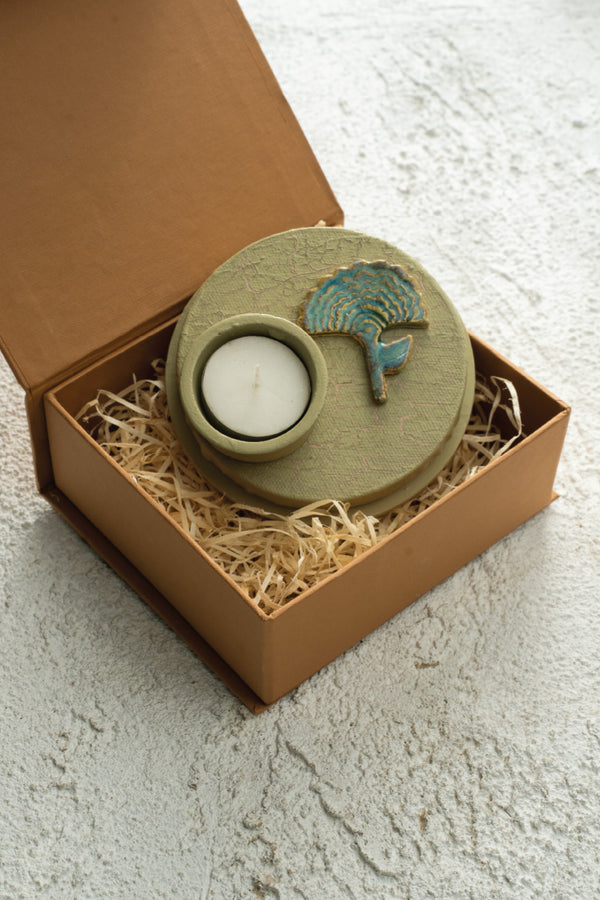 Ceramic motif mounted on canvas with a mdf base